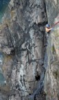 Following a beautiful crack above the sea, perhaps one of the best routes at Otter Cliffs