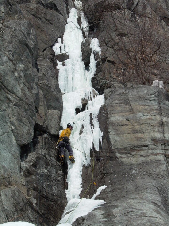 With the gear in place, the ice column can be safely climbed