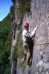 Traversing to the belay on the first pitch of 3D