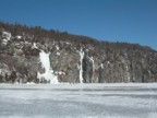Approaching the Palisades across the ice of Lake Champlain from the Vermont side