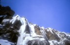 The crux of the route climbs melted ice on black rock. The ice in the corner is shaded and therefore more solid than the ice on the face.