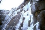 Joe climbs the steeper ice; the crux is just above