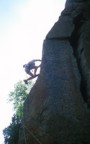 Climbing the dramatic arete; this crux is moving onto the face (at the level of the gear in the photo), but the top is no giveaway