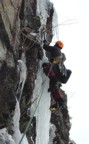 The free-hanging pillar is the crux of this route, although the unprotected climbing above is engaging