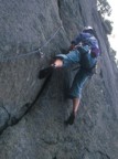 Jim at the start of the second pitch (yes, those are bolts next to the crack; what you can't see is that the crack is really the left edge of an enormous arrowhead-shaped detached block)