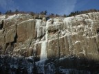 A climber on the first pitch of Positive Thinking in super fat conditions