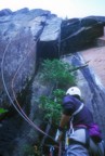 Dennis leads the crux of the route while Jim belays