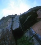 Dennis finally nails the crux and struggles with the hand jams above