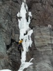 With the gear in place, the ice column can be safely climbed