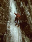 Tommy leading the steep ice smear of Laceration