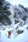 Climbing a pillar on the east side of Avalanche Pass before one reaches the lake; the climb is broken into two parts -- the initial pillar to a ledge, then a rock overhang