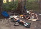 Tracy and Jim relaxing after a day of hiking; notice the paper towels, Sierra Club cups, and prototype Marmot bivy sacks