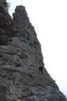 Colin follows the first pitch, belayed from above by Tom, just before a major storm hit