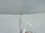 Breaking through the cornice onto the flat summit plateau