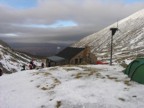 Climbers gearing up at the CIC hut; Jim is the tall one in the orange top