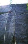 Reaching for the upper crack in Dresden; the climb ascents Nutcracker for a bit, then moves leftwards into the crux Dresden crack