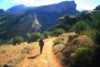 Hiking through olive groves to the crag