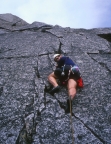 Leading the cracks on the headwall on the seventh pitch