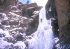 Joe climbs the third pitch of Mean Green (WI4); the pitches here are separated by several hundred meters of easy scrambling up the drainage