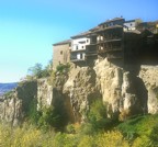 Houses built over the cliff in the old section of Cuenca