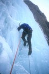 Joe climbs the second pitch (WI4) in a snow squal