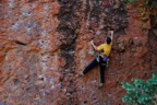 Jug pulling on a steep, beautiful wall