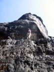 An overhanging handcrack; the crux was the slopey, sandy moves after the crack