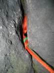 A small jammed knot on the second pitch