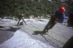 Jen and Brian get organized to film climbing on the third pitch of Bennedictus