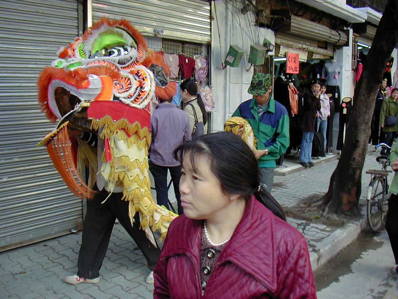 Lion dancer in the streets of Guangzhou