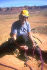 John poses on the summit