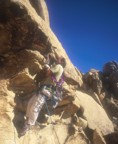 Phil places gear at the intimidating roof near the start of the climb