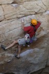 Long reaches on overhanging rock constitute the crux of Clean and Jerk