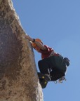 Weird layback moves up the arete of Garden Angel