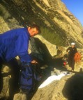 Jim and Belen pack for the hike back to the car after a full day climbing