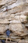 Jeremy at the crux of the .11a on the left side of the wall