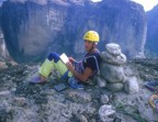 Ares reads the summit register on top of Heilger Geist