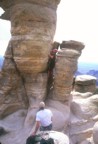 Lori climbs up the west side of the pinnacle