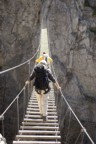 Crossing the bridge on the via ferrata