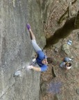 Shallow jams at the crux, belayed from below by Joe