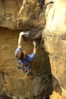 Steep moves out of the chimney lead to easier climbing