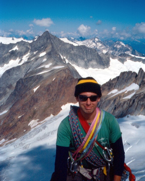 Tracy lookin' happy on the summit of Sahale; Forbidden is in the background