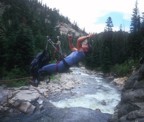 Nikos rushes across the Tyrolean on return from the Secret Crag