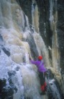 Simeon at the start of Men with Guns; the route ascends the runnel of ice above Simeon's head