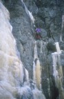 Simeon climbs mixed rock on the first pitch