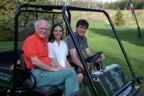 Jim, Lucie, and Jack sitting in the Mule