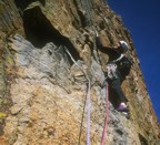 Climbing the 8th pitch, which is actually on the east side of the pinnacle