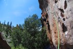 Cranking on a jug in a sea of rock