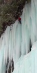 At the top of the column, the route climbs into the overhanging root ball of a tree, then climbs the branches, and finally the rock to the rim of the Gorge