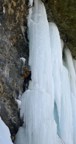 At the "flat stance" on Chum Lick; the route bridges up between the rock and ice (using Chum's bolts), then corkscrews around to the front of the column and on to the top